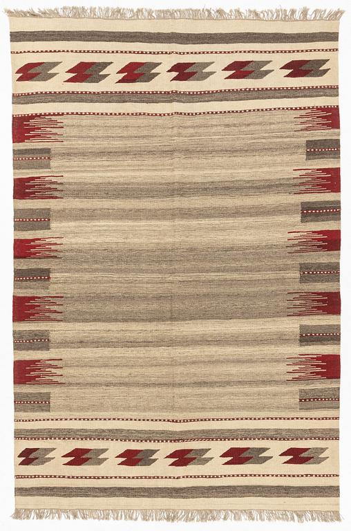 A Persian Kilim carpet, c. 288 x 195 cm.