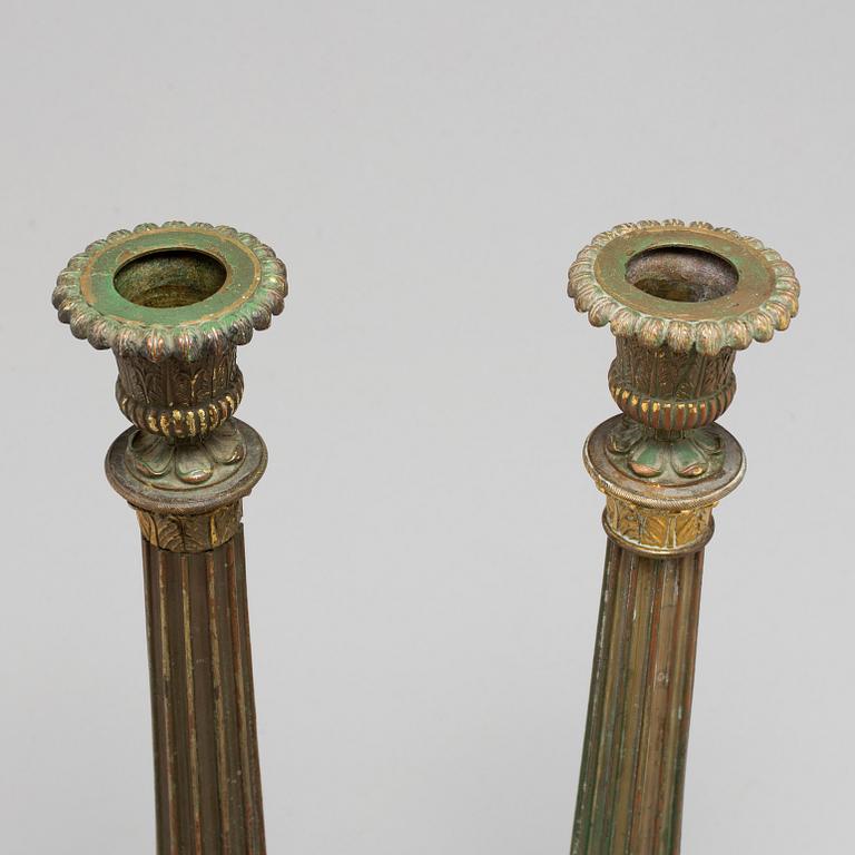 A pair of bronze gustavian candlesticks, late 18th century.