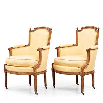 A pair of Louis XVI late 18th century bergeres by Claude Lerat (master in Paris 1785).