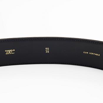 Chanel, a patent leather belt.