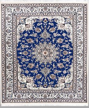 A rug, Nain, ca 210 x 122 cm.