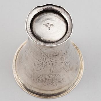 A silver creamer, beaker, and platter, Sweden, 18-19th century.