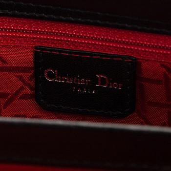 Christian Dior, a 'Lady Dior East West' bag.