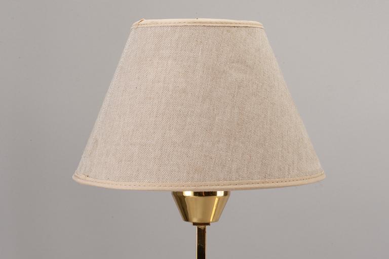 A PAR OF BRASS TABLE LAMPS FOR NORDISKA KOMPANIET.