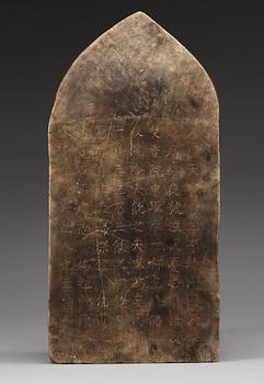 A carved stone stele with, dated according to inscription on reverse to Tang dynasty. Presumably later.