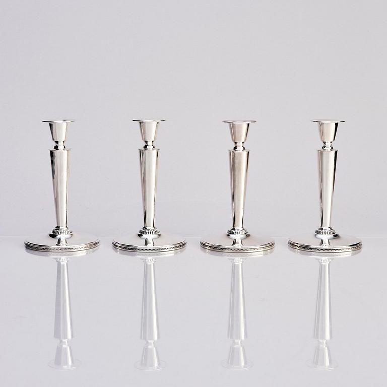 Eric Råström, four silver candlesticks, firm CG Råström, Stockholm 1964-65.