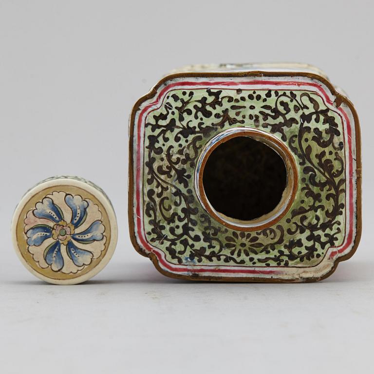 An enamelled caddy with cover and a dish, Qing dynasty, 18th century.