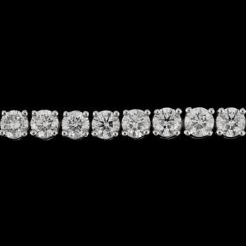 1056. A brilliant cut diamond bracelet, tot 9.55 cts.