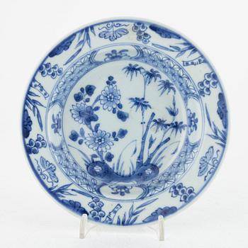 A blue and white porcelain dish, cup and saucer, China, Qing dynasty, 18th century.