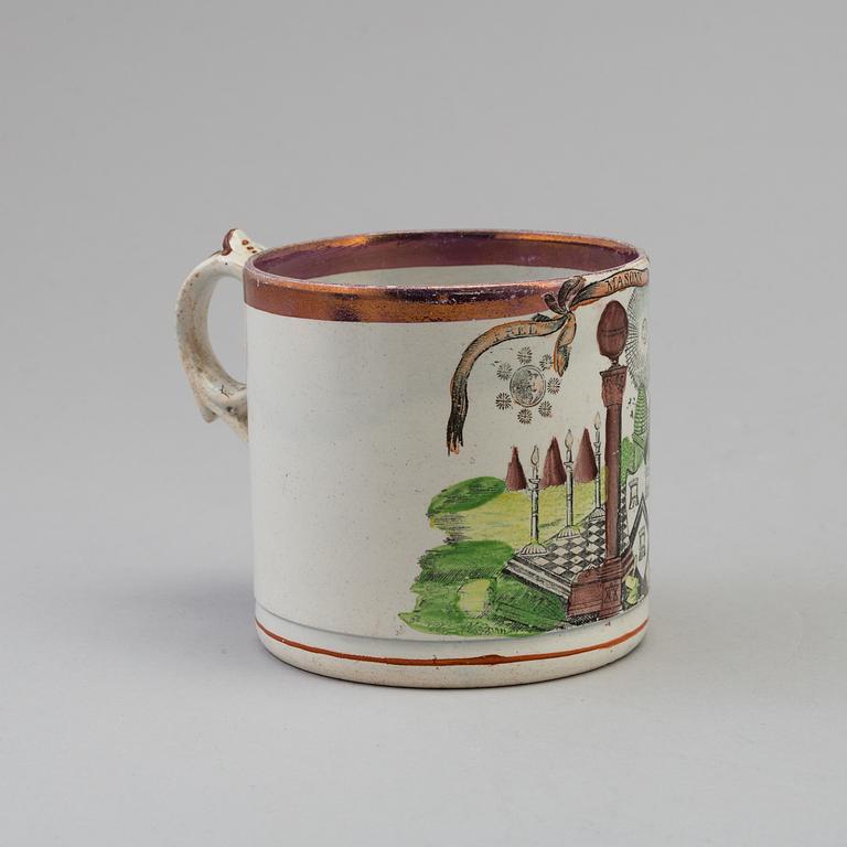 AM ENGLISH CREAMWARE MASONIC MUG, first half of the 19th century.