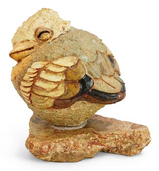 A Tyra Lundgren stoneware figure of a bird.