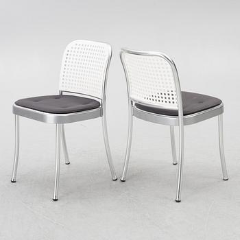 Vico Magistretti, a "Shine" dining table with twelve chairs, De Padova, Italy, around the year 2000.