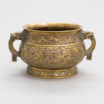 A 20th-century bronze incense burner, marked Hu Wenming.