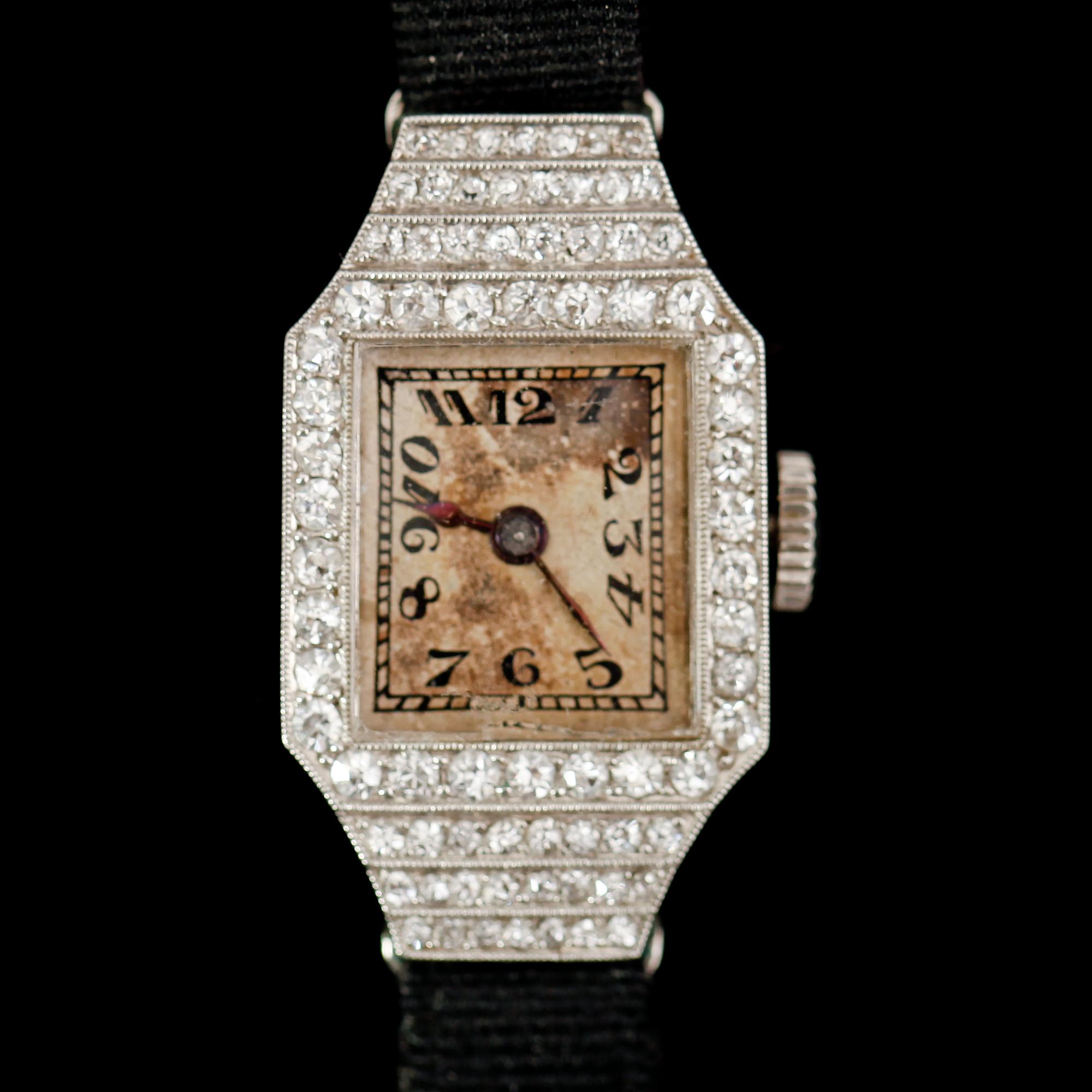 DAMARMBANDSUR, 18 k guld, diamanter tot ca 0.60 ct, 1920-/30-tal.