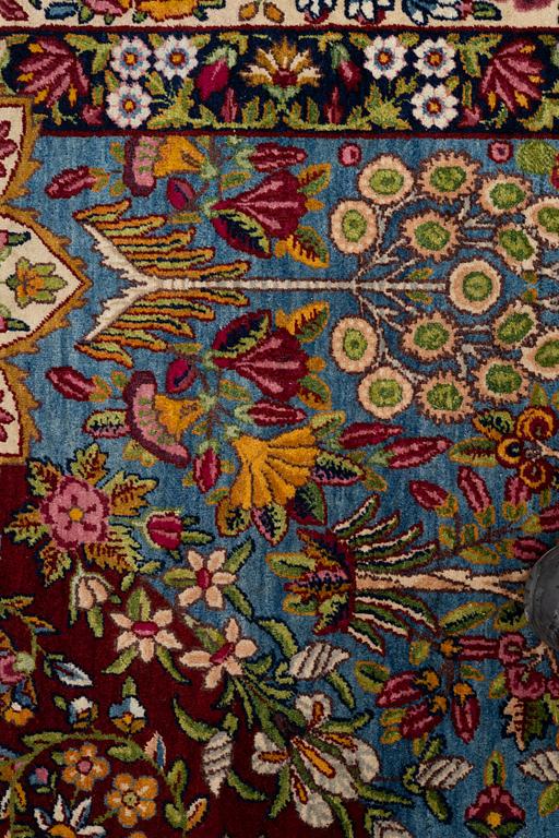 A carpet, semi-antique Kerman, ca 453 x 340 cm.