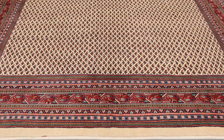 A Sarouk Mir carpet, approx. 405 x 317 cm.