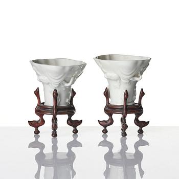 Two blanc de chine rhinoceros libation cups, Qing dynasty, Kangxi (1662-1722).