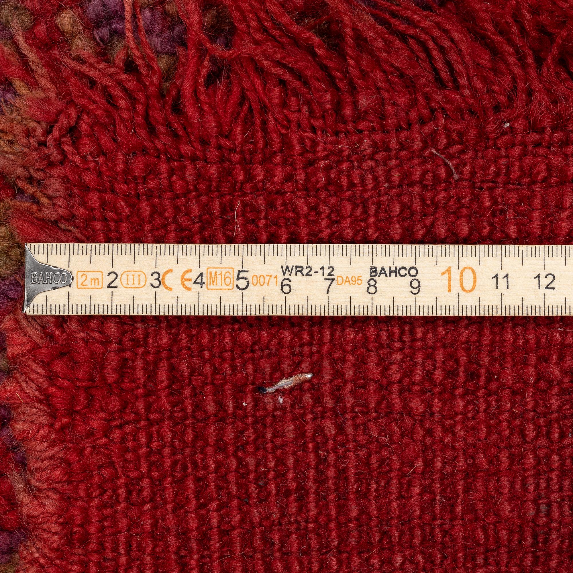 An antique Ushak carpet, West Anatolia, approx. 327 x 250.