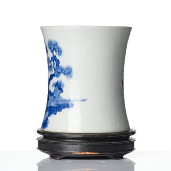 A blue and white brush-pot, bitong, Qing dynasty, 19th century with an apochrypal Kangxi mark.