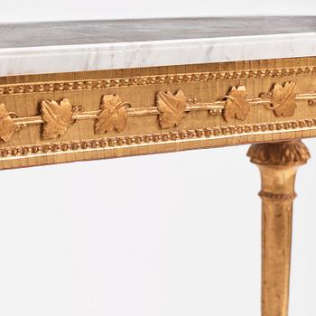 A Gustavian carved giltwood and marble console by O. C. Lindmark (master in Stockholm 1779-1813).