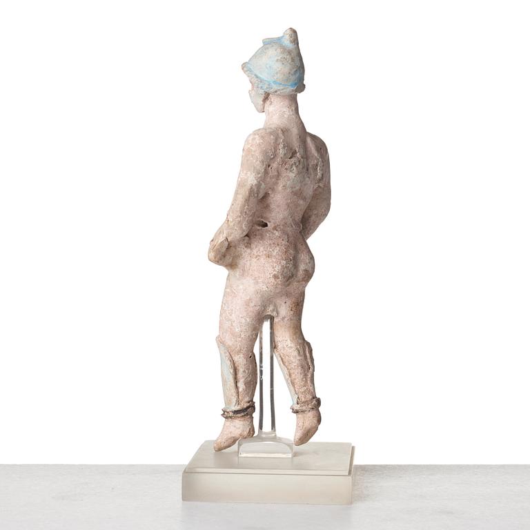 A Greek terracotta sculpture of a warrior, Hellenistic period, Canosa, 3rd Century B.C.