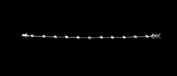 557. RANNERENGAS, briljanttihiottuja timantteja n. 0.90 ct. 18K valkokultaa. Pituus 18,5 cm. Paino 19 g.
