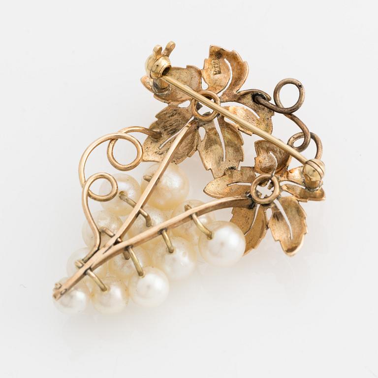 Brosch, guld med pärlor i form av druvklase.