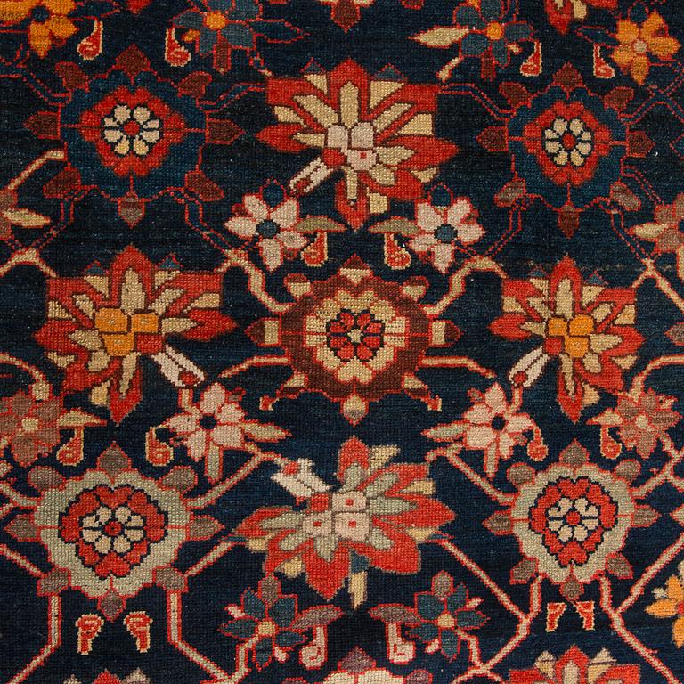A Hamadan rug of 'Mina Khani design'. Circa 197 x 131 cm.