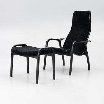 Yngve Ekström, a 'Lamino' easy chair with foot stool, Swedese 2010.