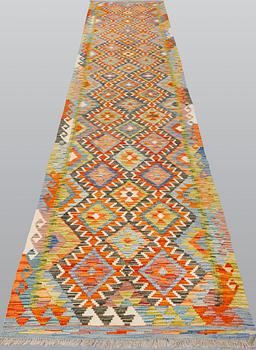 A kilim runner, ca 492 x 80 cm.