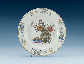 1635. A set of four famille rose plates, Qing dynasty, early Qianlong, circa 1740.