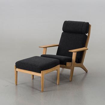 A HANS J WEGNER "GE 290" ARMCHAIR AND STOOL, Getama.