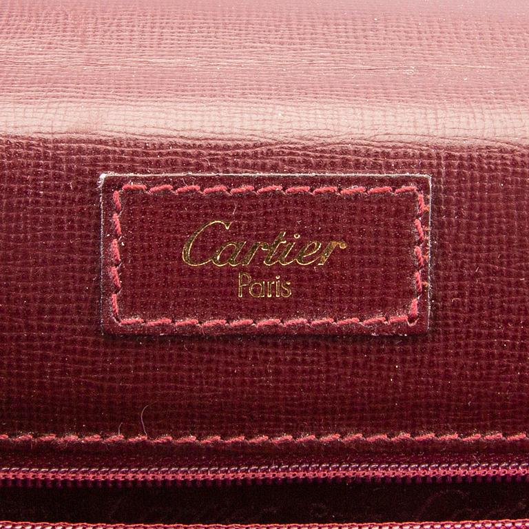 A Cartier leather briefcase.