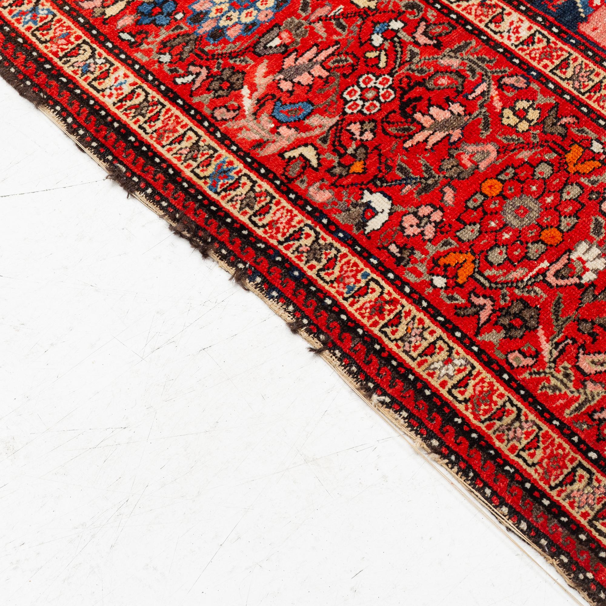 A Farahan carpet, c. 520 x 205 cm.