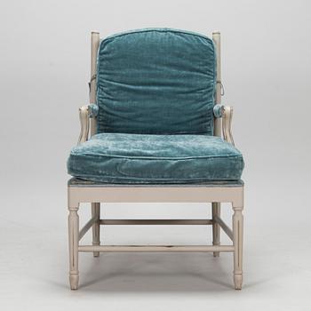 A Gustavian style armchair from the latter half of the 20th century.