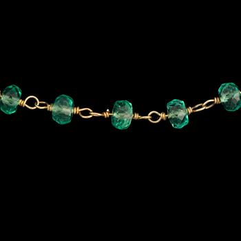 48. An emerald necklace. Total gem weight circa 57.70 cts.