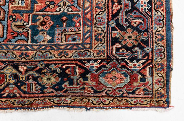 A semi-antique Heris carpet, c. 364 x 299 cm.