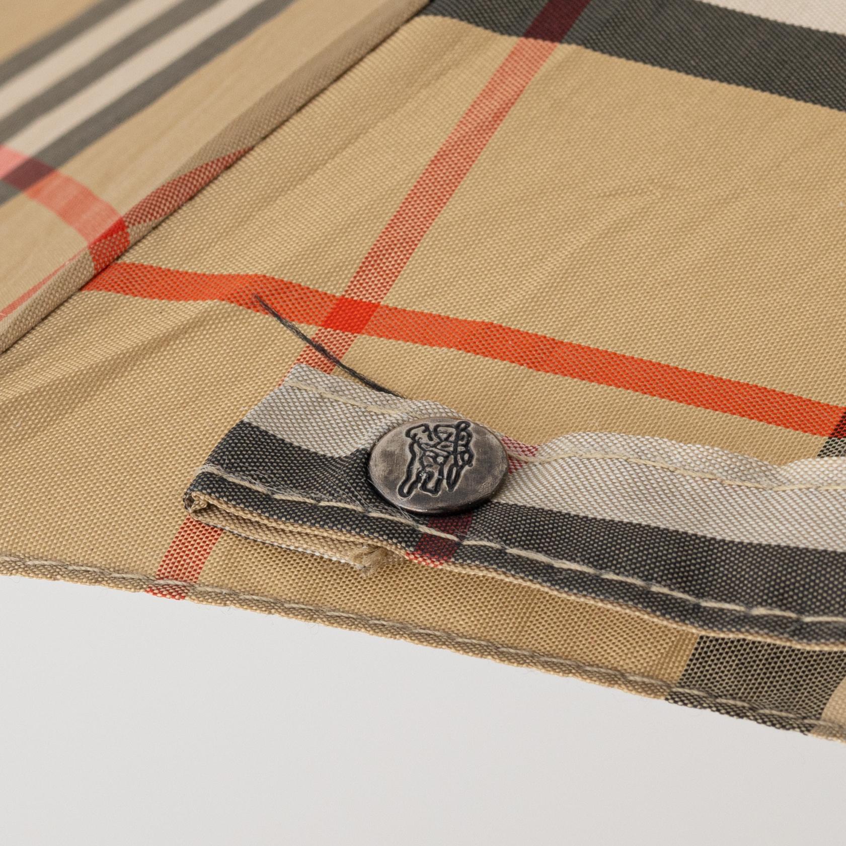 Burberry, an umbrella.
