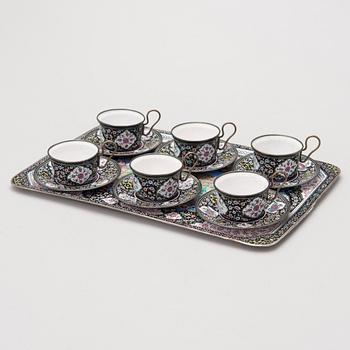 A 7-piece Persian coffee set, circa 1900.