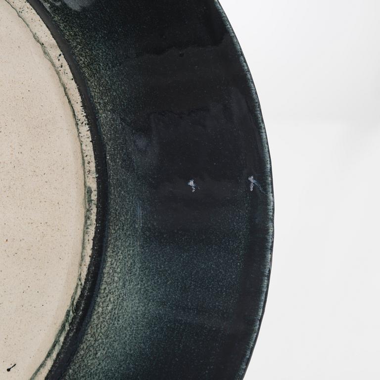 Birger Kaipiainen, a stoneware decorative dish signed Kaipiainen Arabia.