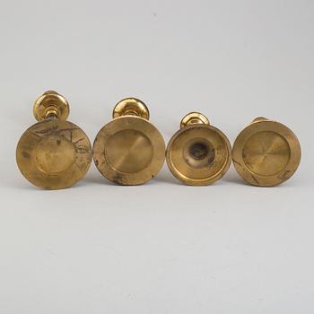 CARL HJALMAR NORRSTRÖM, four brass and stone candlesticks from Skultuna, numbered 073/300, 1997.