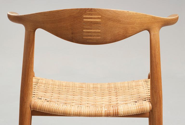 Hans J. Wegner, a set of six oak "Cowhorn Chairs", JH-505, Johannes Hansen, Denmark 1960's.