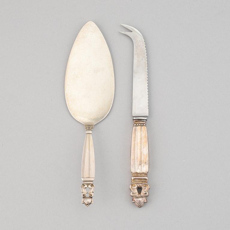 A silver sandwish spade and a silver and stainless steal cheese knife, "Konge/Acorn" from Georg Jensen.