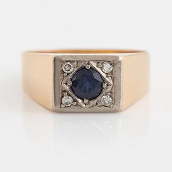 Sapphire and small diamond ring.