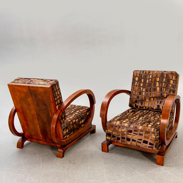 A pair of Art Deco easy chairs.