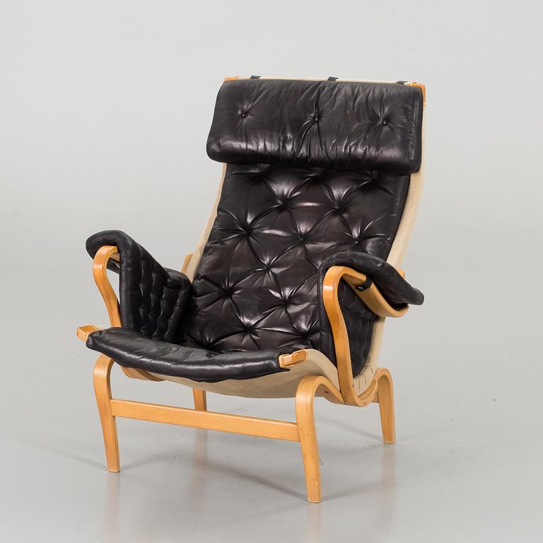 BRUNO MATHSSON, a Dux "Pernilla" lounge chair.