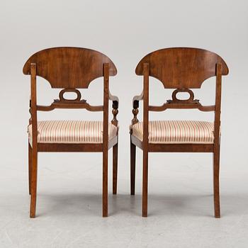 A pair of mahogany armchairs, mid 19th Century.