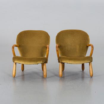 A pair of armchairs attributed to PHILIP ARCTANDER, 'Clam Chair'/'Muslinge', 1940's/50's.