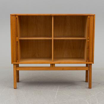 A Walnut veneered cabinet, 1950's/60's.