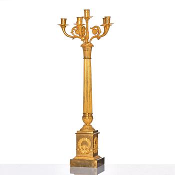 A French late Empire gilded six-light candelabra, mid 19th century.